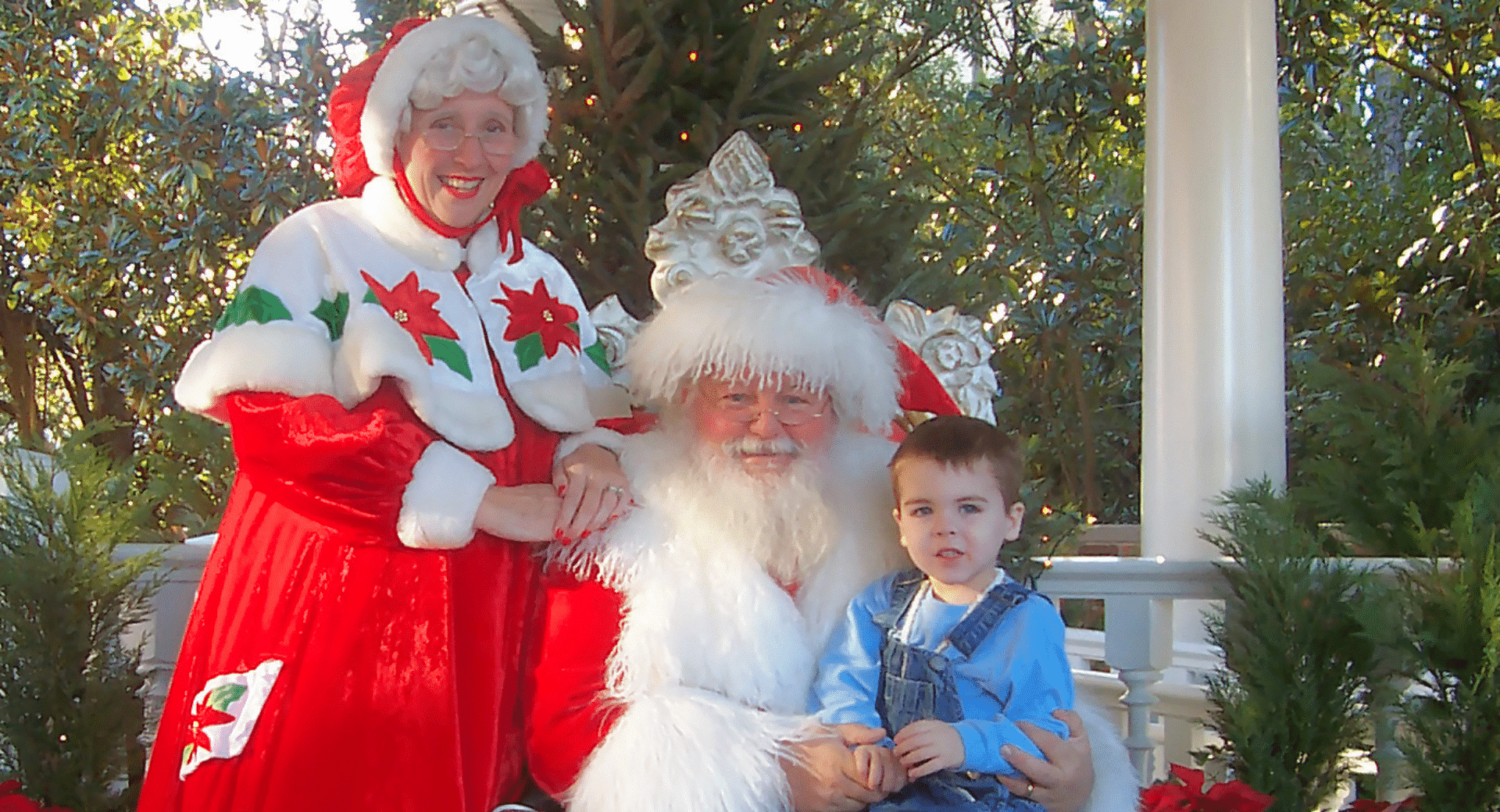 Child with Santa claus at Walt Disney World's Epcot Center