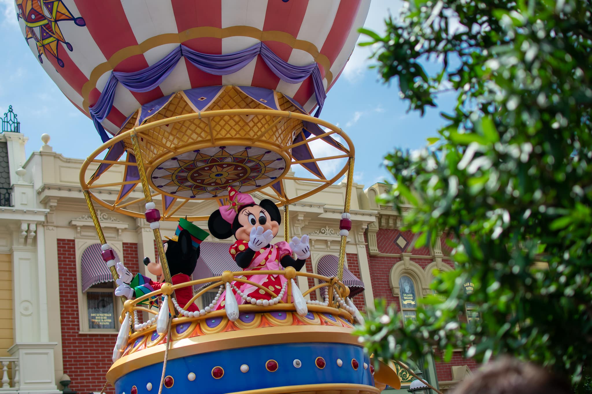 Mickey and Minnie in the Festival of Fantasy Parade at Magic Kingdom park